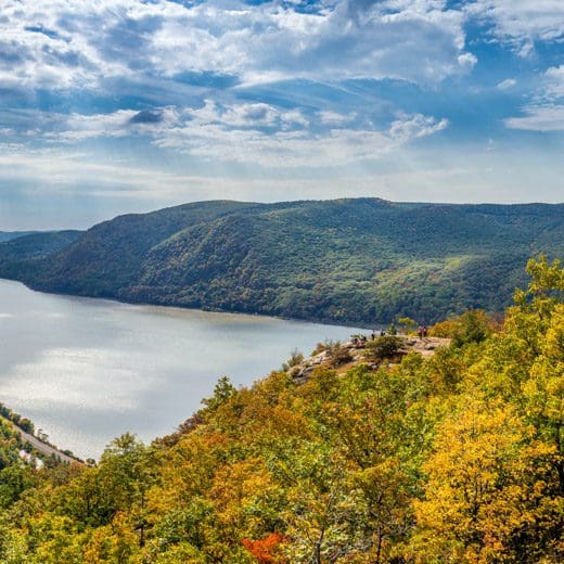 photo of lake with mountains