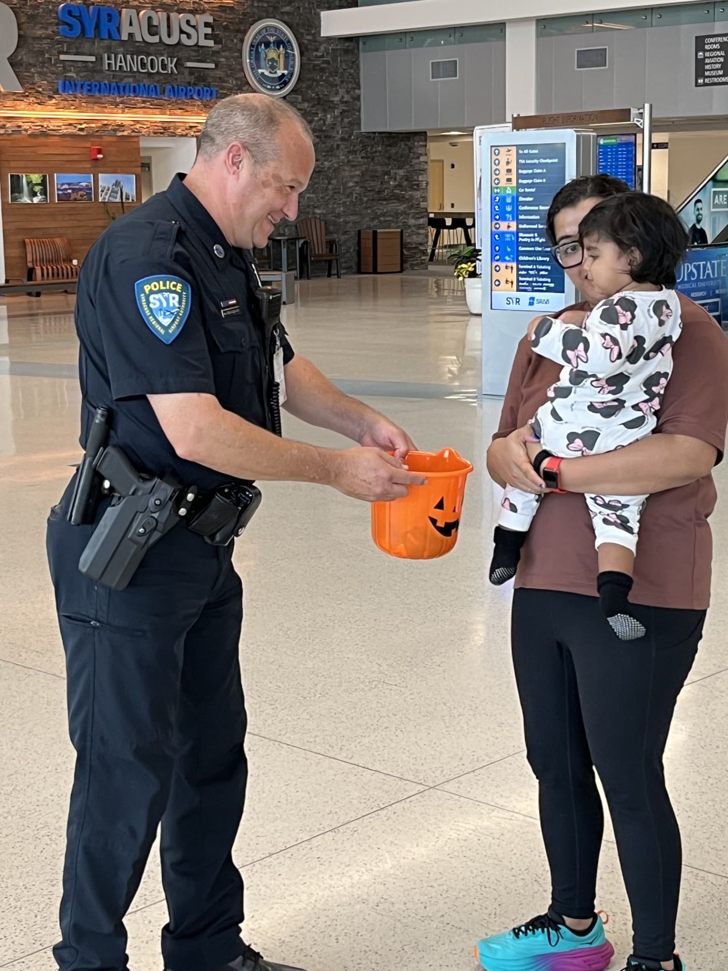 SRAA PD Officer hands out Halloween Candy